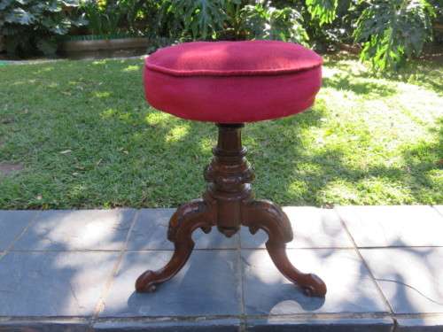Red Victorian piano stool