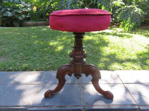Red Victorian piano stool