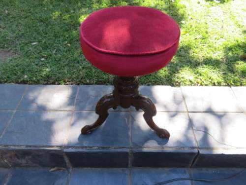 Red Victorian piano stool