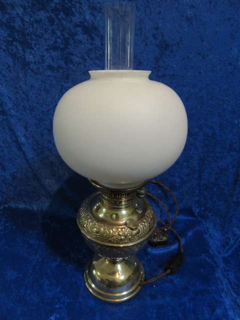 Victorian embossed brass electrified Millers paraffin lamp.