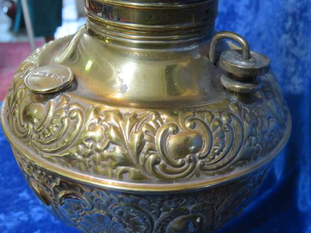 Victorian embossed brass electrified Millers paraffin lamp.