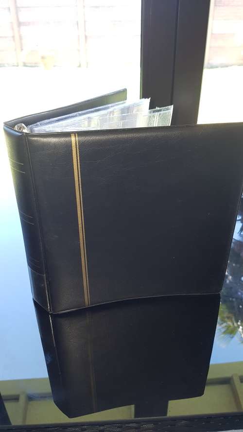 Black coin book/album with 17 brand new pages
