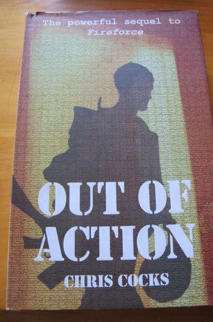 RHODESIA - OUT OF ACTION - CHRIS COCKS - HARDBACK EXCELLENT CONDITION