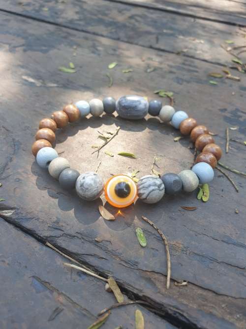 Grey Jasper gemstone & coral evil eye beaded bracelet