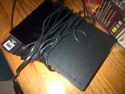 SONY PLAYSTATION 2, 2 REMOTES, 16MB MEMORY CARD AND 8 GAMES!!!