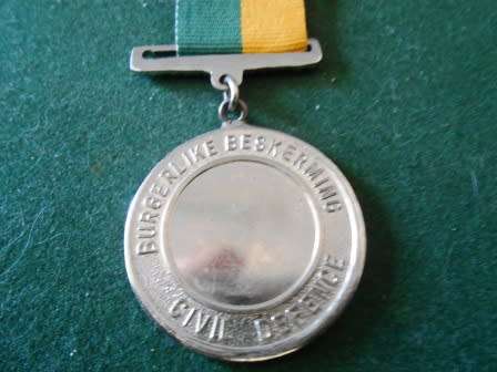 Civil Defence Medal *** Not sure if official or sports medal ***