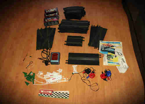 1960's Scalextrix set with 30x 156mm wide tracks,3 cars,transformer,4 controllers + more