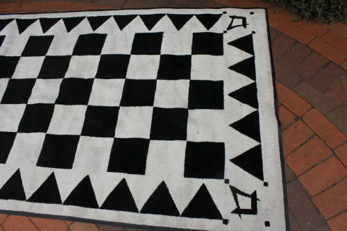 Masonic carpet, with black and white squares.100% nylon pile on rubber backing 1485x2350mm