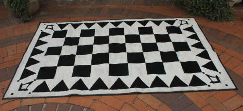 Masonic carpet, with black and white squares.100% nylon pile on rubber backing 1485x2350mm