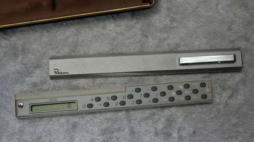 Vintage Satolex Pearl Silver Pocket Man Pen/Calculator in box calculator not working