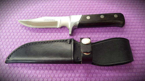 Sterling Rustproof Fix blade Knife with Leather sheath .. Unused