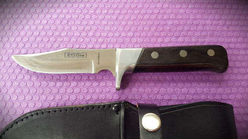 Sterling Rustproof Fix blade Knife with Leather sheath .. Unused