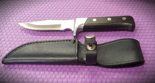 Sterling Rustproof Fix blade Knife with Leather sheath .. Unused