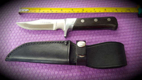 Sterling Rustproof Fix blade Knife with Leather sheath .. Unused