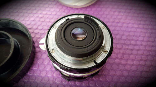 Vintage Nikon Nikkor-H Auto 1:3.5 f=28mm- 724953 Lens in Holder with caps