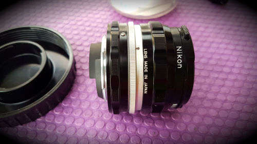 Vintage Nikon Nikkor-H Auto 1:3.5 f=28mm- 724953 Lens in Holder with caps