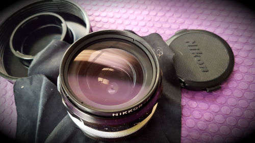 Vintage Nikon Nikkor-H Auto 1:3.5 f=28mm- 724953 Lens in Holder with caps