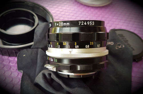 Vintage Nikon Nikkor-H Auto 1:3.5 f=28mm- 724953 Lens in Holder with caps