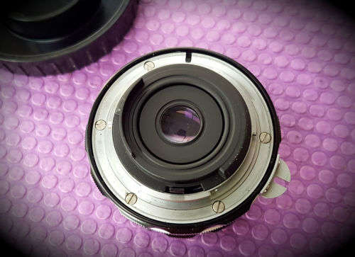 Vintage Nikon Nikkor-H Auto 1:3.5 f=28mm- 724953 Lens in Holder with caps