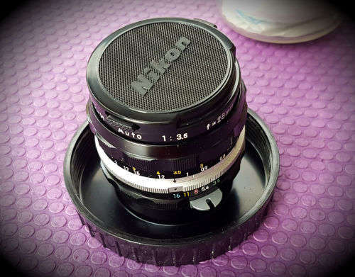 Vintage Nikon Nikkor-H Auto 1:3.5 f=28mm- 724953 Lens in Holder with caps