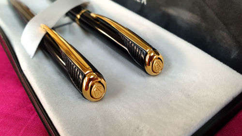 Vintage Black and Gold Parker Pen and Pencil set U.K with standard bank logo in origanal Packaging