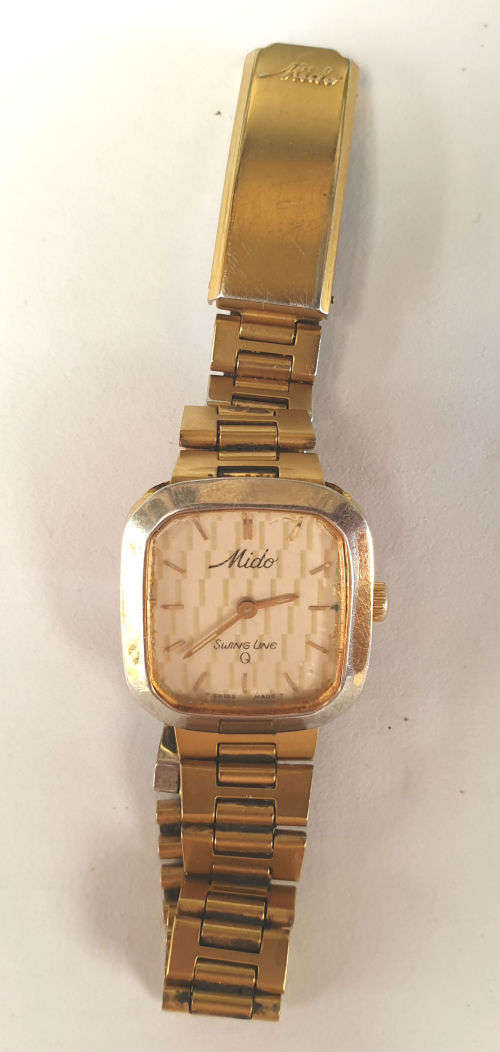 Vintage Swiss Made 1980`S MIDO Swing line Q Ladies Quartz watch  with Mido Strap-working