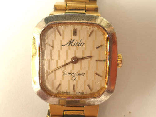 Vintage Swiss Made 1980`S MIDO Swing line Q Ladies Quartz watch  with Mido Strap-working