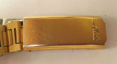 Vintage Swiss Made 1980`S MIDO Swing line Q Ladies Quartz watch  with Mido Strap-working