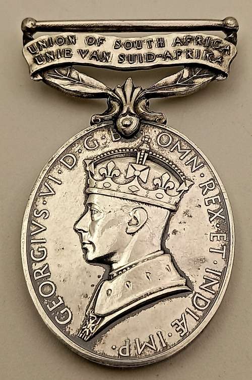WW2 Union of South Africa  For efficient service medal OVAL (SILVER )Issued to S.G.T R.McGibbon
