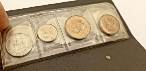 7 Vintage 1964-1977 Rhodesia Coins in Plastic Coin Flip -Uncirculated