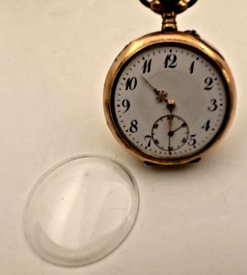 Antique  MK (Michael Kors) Pocket watch not working (for spares) see all photos (lens is loose)