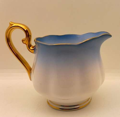 Royal Albert Rainbow Blue Creamer (Very Tiny nick on rim see photos )