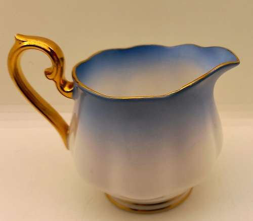 Royal Albert Rainbow Blue Creamer (Very Tiny nick on rim see photos )