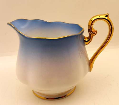 Royal Albert Rainbow Blue Creamer (Very Tiny nick on rim see photos )