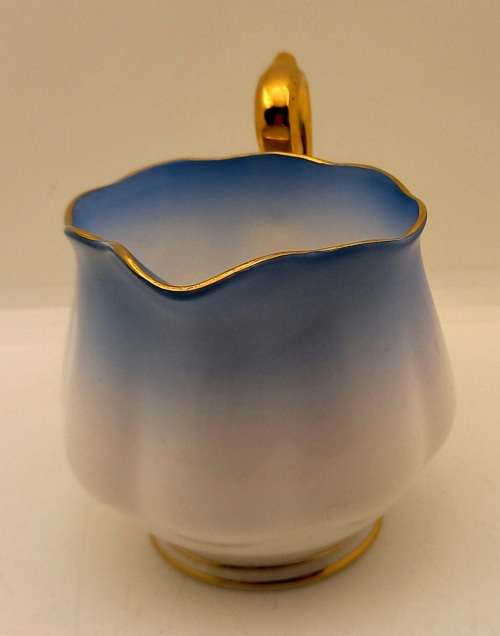 Royal Albert Rainbow Blue Creamer (Very Tiny nick on rim see photos )