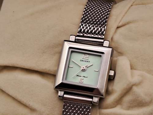 Pre-owned  Vintage Un-Used Orient ladies Watch -Working with new battery-still in packaging