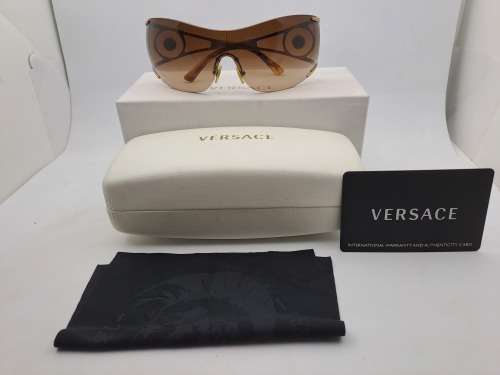 Pre-owned Versace Sunglasses still in packaging