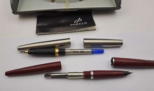 Vintage Maroon Parker Fountain Pen and Parker Frontier Rollerball in very nice parker case