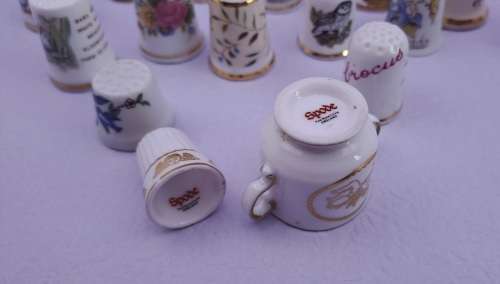 Lot of 22 Items - 21 Vintage Thimbles -plus 1 Miniature Cup (Doulton, spode etc. )