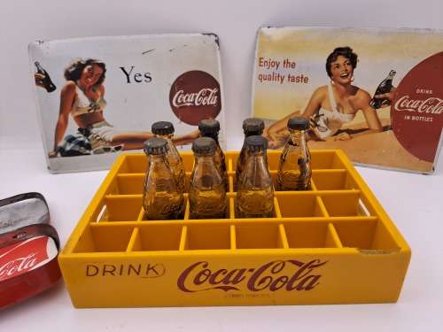 4 Vintage Coca Cola Items. Miniture Crate with 7 Coke bottles, 2 Metal Postcards and note Tin
