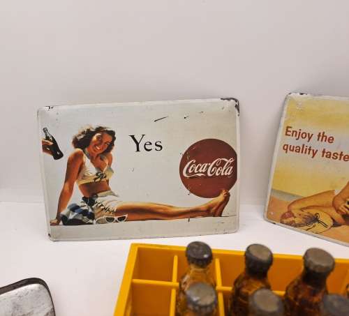 4 Vintage Coca Cola Items. Miniture Crate with 7 Coke bottles, 2 Metal Postcards and note Tin