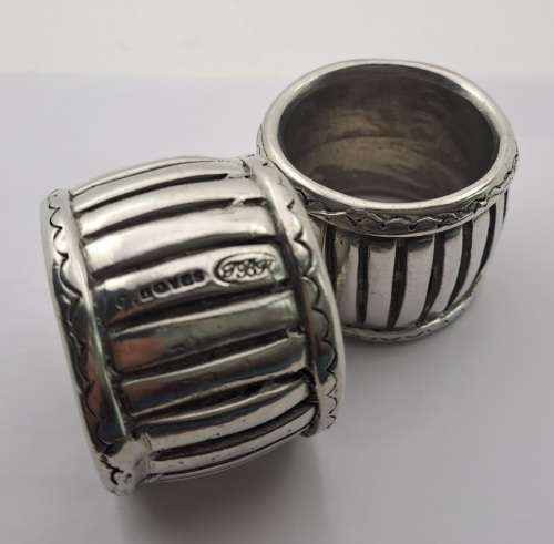 A Pair of Napkin/serviettes Rings designed by CARROL BOYES  46x34mm (solid design)