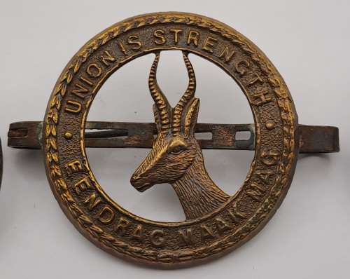 7 x South African Infantry Brigade Cap Badges -1 x WW1 and 6 x WW2