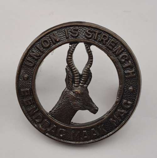 7 x South African Infantry Brigade Cap Badges -1 x WW1 and 6 x WW2