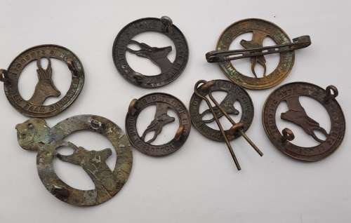 7 x South African Infantry Brigade Cap Badges -1 x WW1 and 6 x WW2