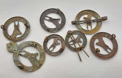 7 x South African Infantry Brigade Cap Badges -1 x WW1 and 6 x WW2