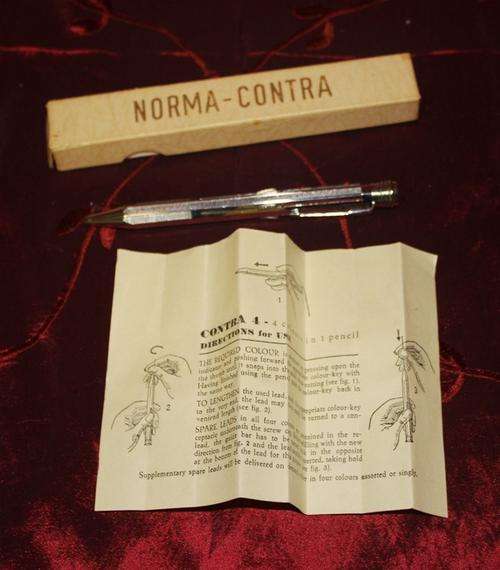 A Vintage Norma - Contra - 4 Colours in one Pencil in origanal box ..see photo's (spare leads )