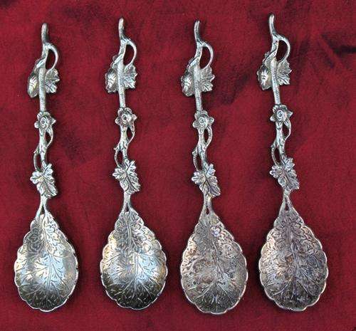 4 EPNS spoons with rose detail see photo's 112mm
