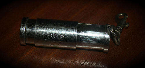 A Metal CAMEL flint or coin?  Holder - slides open and close