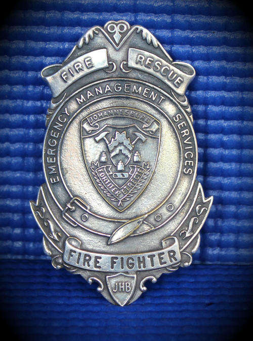 A Vintage JHB Fire Fighter Chest Shield (Silver) 72x50mm- 21g